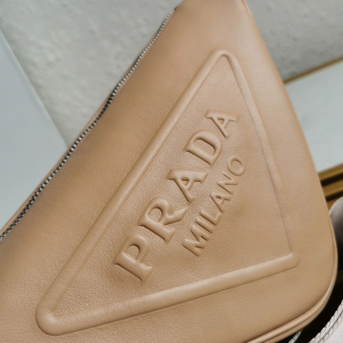 Boutique Quality || Prada Triangle Shoulder Bag in Beige