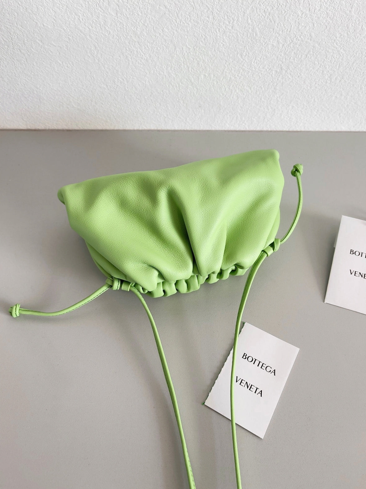 Boutique Quality || Bottega Veneta Mini Pouch with Strap Pistachio