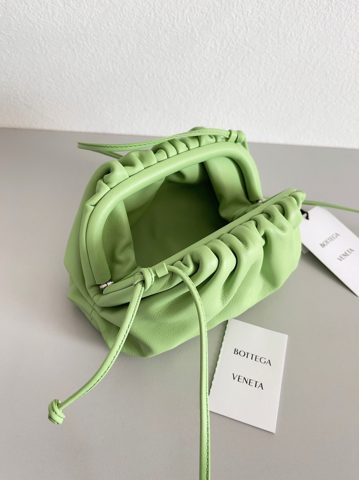 Boutique Quality || Bottega Veneta Mini Pouch with Strap Pistachio