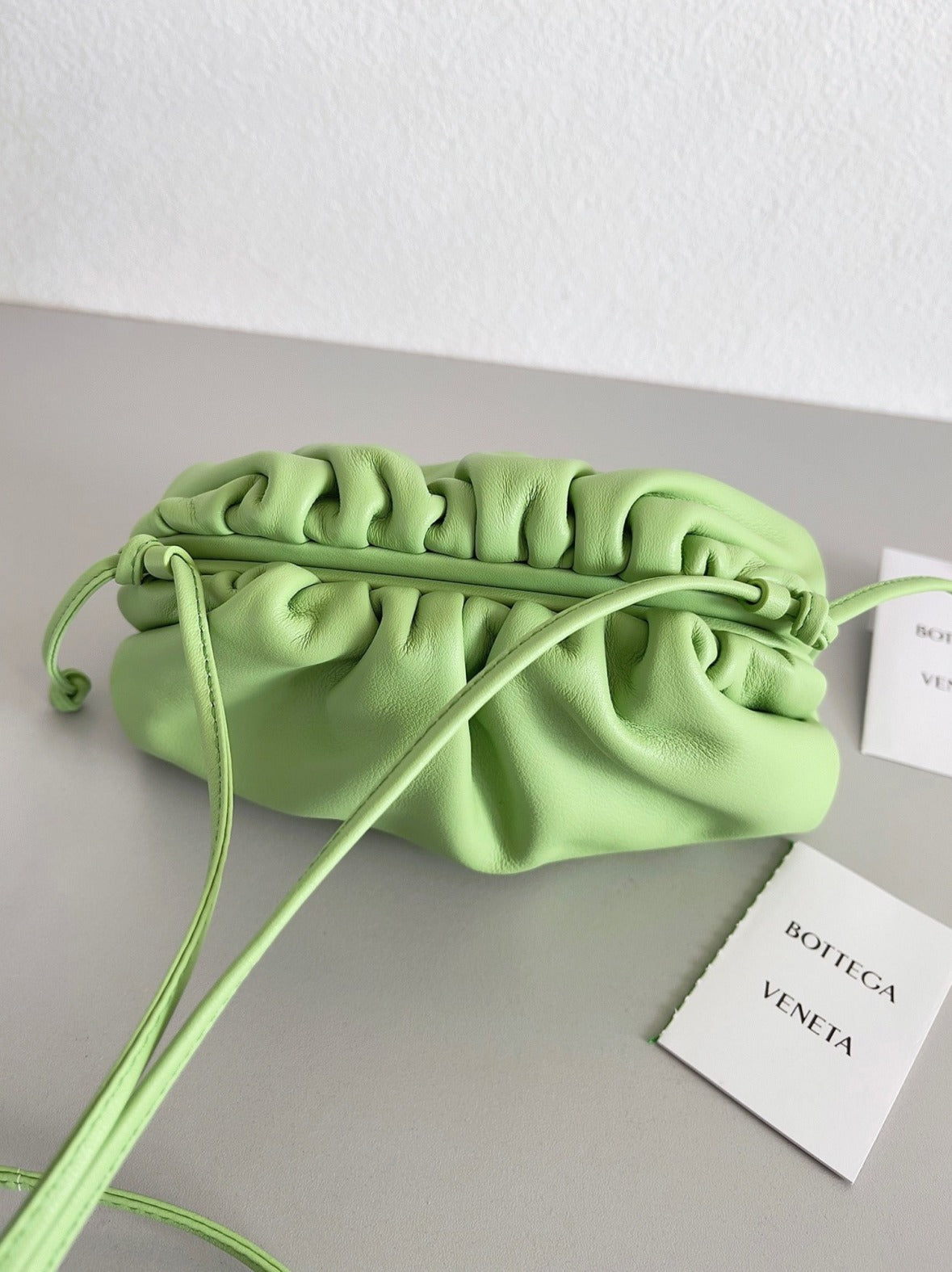 Boutique Quality || Bottega Veneta Mini Pouch with Strap Pistachio