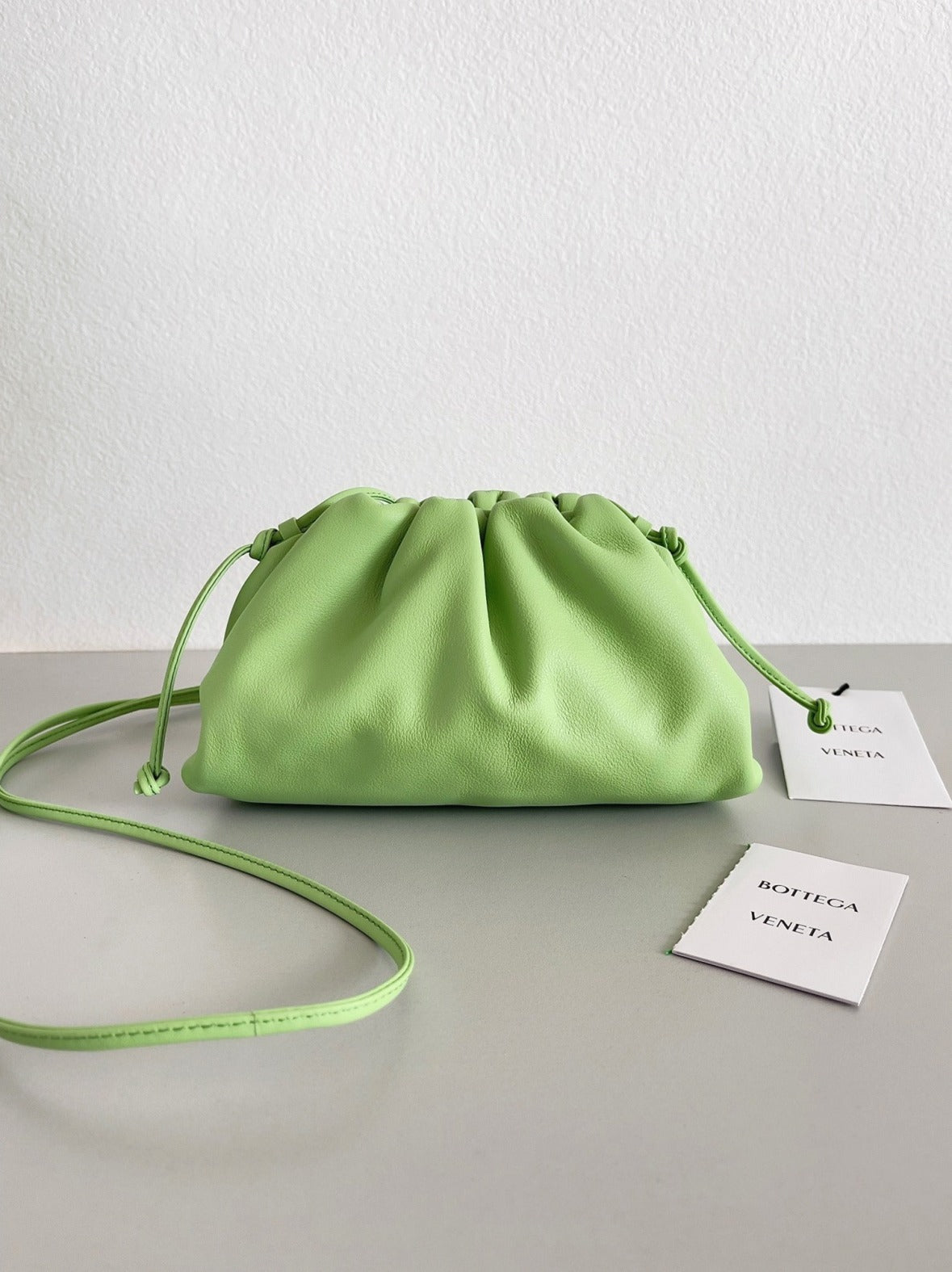 Boutique Quality || Bottega Veneta Mini Pouch with Strap Pistachio