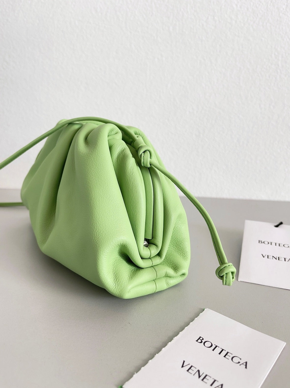 Boutique Quality || Bottega Veneta Mini Pouch with Strap Pistachio