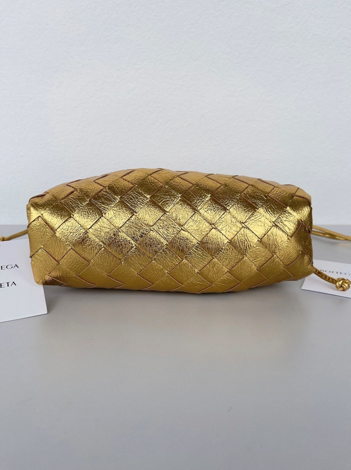 Boutique Quality || Bottega Veneta Mini Pouch with Strap Gold
