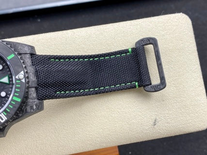 Rolex Submariner Carbon Green watch.