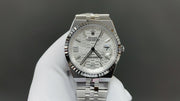 Rolex Land-Dweller watch with a silver dial and fluted bezel