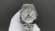 Rolex Land-Dweller watch with a silver dial and fluted bezel