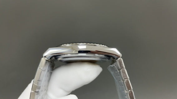 Rolex Land-Dweller watch with a silver dial and fluted bezel